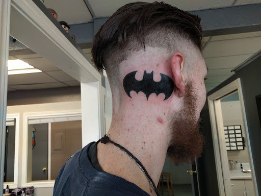 Explore totem pole tattoo ideas, creative tattoo ideas in Anchorage, available at Body Piercing Unlimited