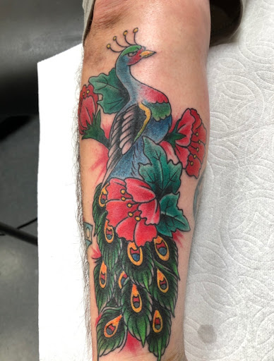 Tattoo Shop «Nine Lives Tattoo», reviews and photos, 61 N Holladay Dr, Seaside, OR 97138, USA