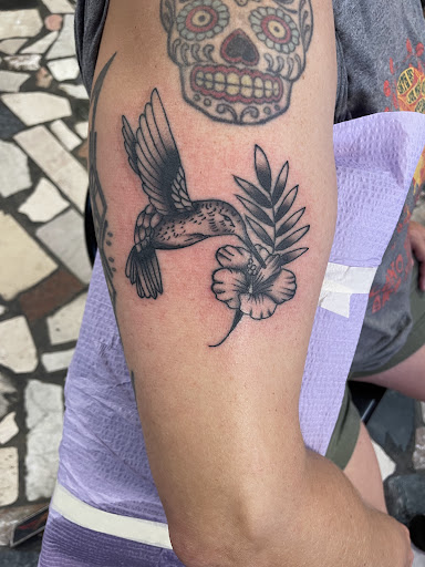 Explore hand tattoos men ideas, creative tattoo ideas in New Orleans, available at Downtown Tattoos and Piercing