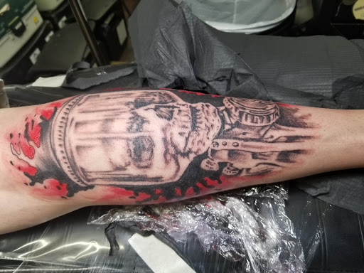 Explore tattoo ideas for men leg, creative tattoo ideas in Wenatchee, available at Rebels Tattoo Studio