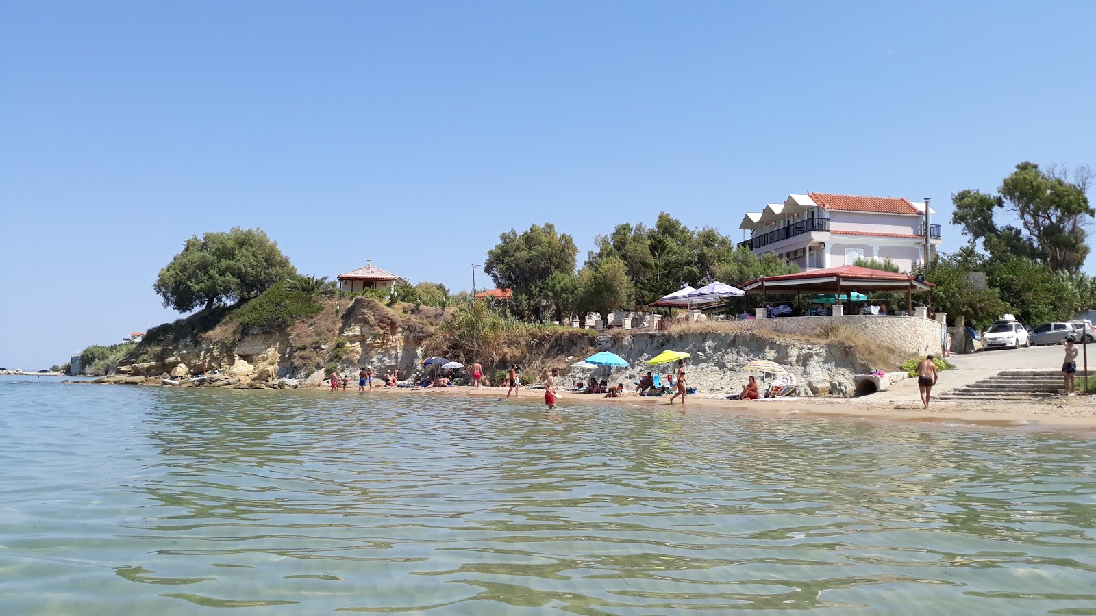 Photo of Psarou beach - popular place among relax connoisseurs