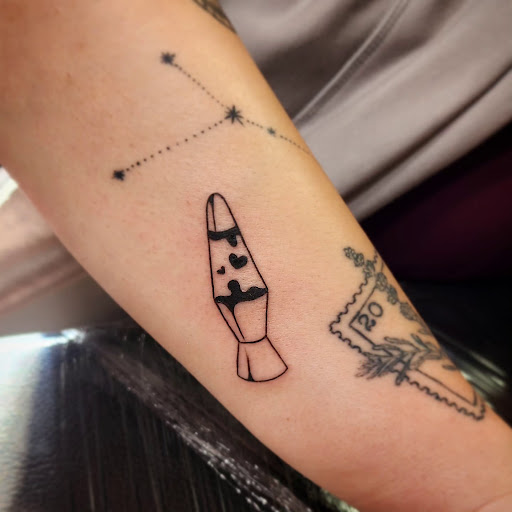 Explore guy side tattoo ideas, creative tattoo ideas in Minocqua, available at Whisky Rose Tattoo Parlor