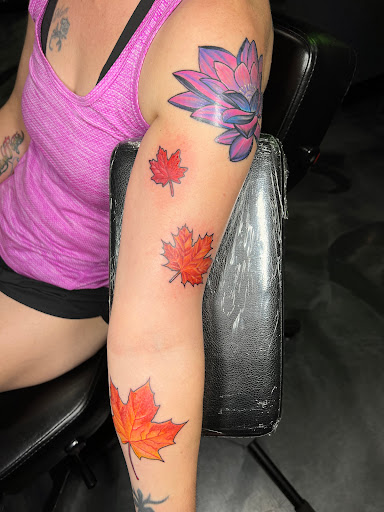 Explore wedding ring tattoo ideas for him, creative tattoo ideas in Peoria, available at Modern Ink Tattoo