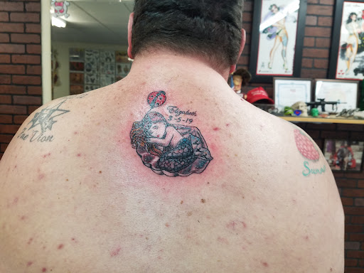 Tattoo Shop «Monkey Business Tattoo», reviews and photos, 3375 E Silver Springs Blvd #102, Ocala, FL 34470, USA