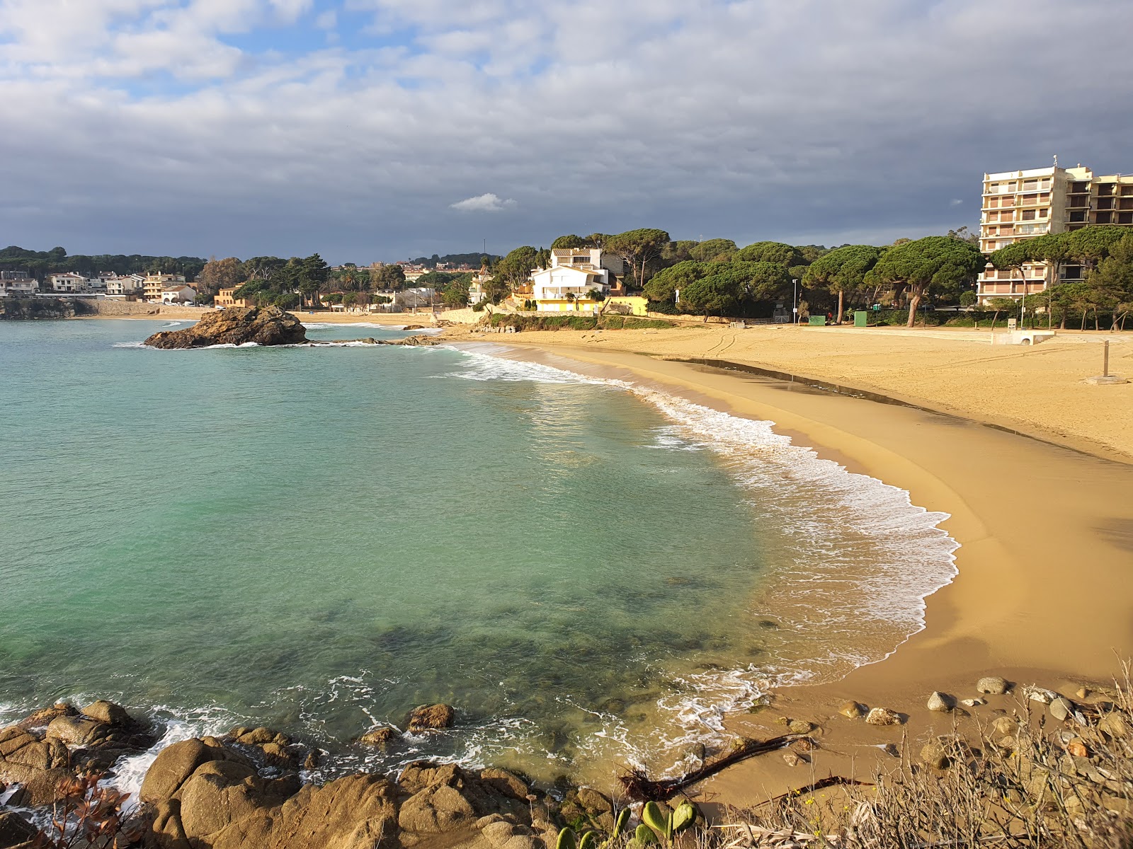 Photo of La Fosca beach with bright sand surface