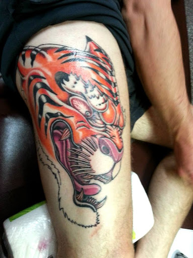 Explore baby feet tattoo ideas, creative tattoo ideas in Rochester, available at Mellow Madness Tattoo Parlor