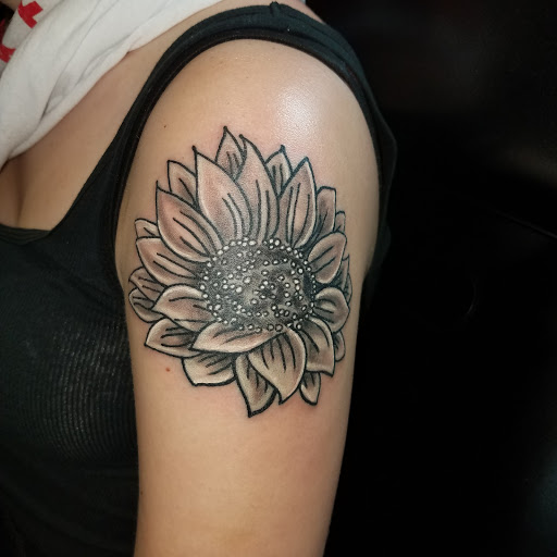 Explore kansas city tattoo ideas, creative tattoo ideas in Hilliard, available at 22 Caliber Tattoo Mega Studio