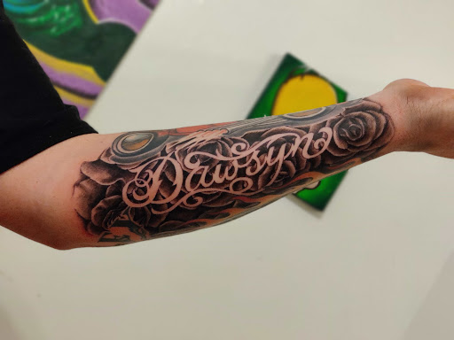 Explore tattoo ideas for top of leg, creative tattoo ideas in Hebron, available at Explosive Ink Tattoo