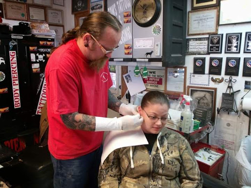 Explore assassins creed tattoo ideas, creative tattoo ideas in Elko, available at Custom Tattoos and Body Piercing Studio