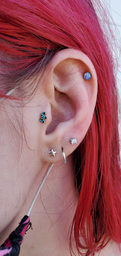 Find male tattoo ideas shoulder for your next unique tattoo in Phoenix at Wholehearted Body Piercing