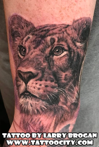 Explore thumbprint tattoo ideas, creative tattoo ideas in Lockport, available at Tattoo City by Larry Brogan