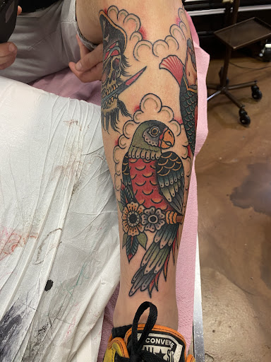 Explore feather memorial tattoo ideas, creative tattoo ideas in Glendale, available at Old West Tattoo