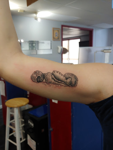 Explore dark romance tattoo ideas, creative tattoo ideas in Yorktown, available at Army Navy Tattoo