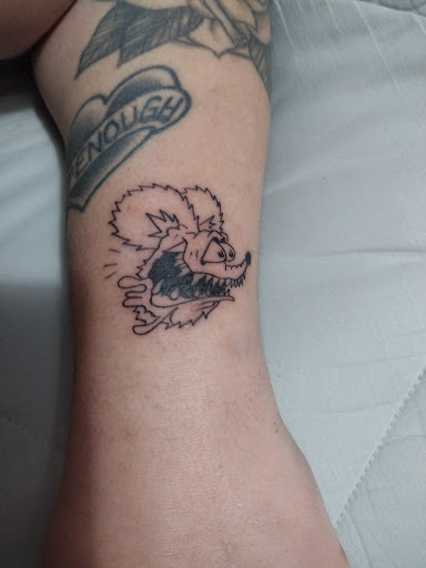 Explore black rose tattoo cover up ideas, creative tattoo ideas in Winter Park, available at Fine Ink Studios Tattoos