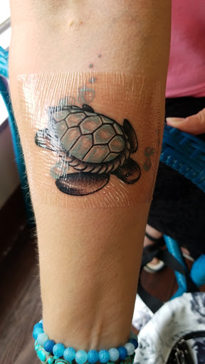 Explore chest tattoo cover up ideas, creative tattoo ideas in Cocoa Beach, available at The Corner Tattoo and Piercing Studio