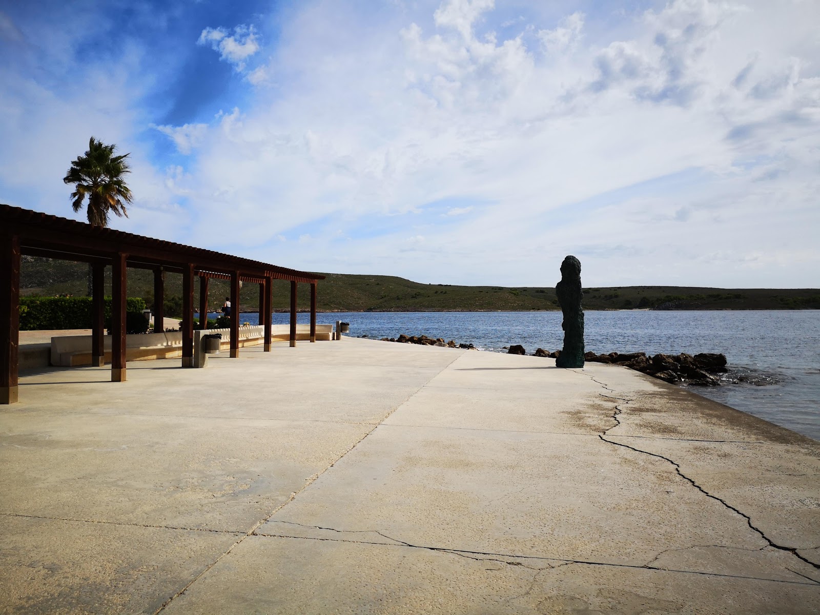 Photo of Cala Fornells with blue pure water surface