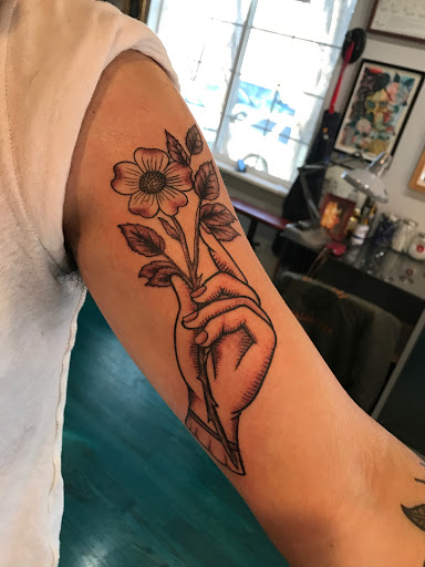 Explore female chest tattoo ideas, creative tattoo ideas in Reno, available at Aces Tattoo