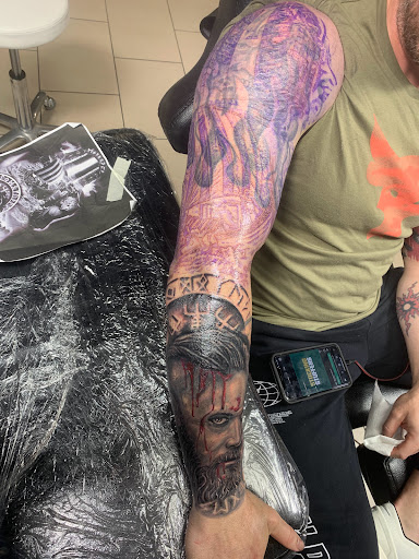 Explore communist tattoo ideas, creative tattoo ideas in Sarasota, available at SEVEN SINS Tattoo Studio