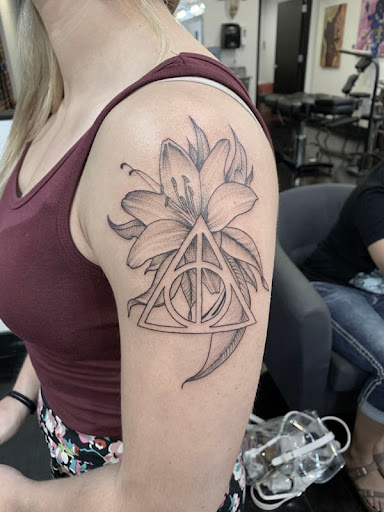 Explore dog tattoo ideas for men, creative tattoo ideas in Washington, available at Fattys Tattoos & Piercings H Street