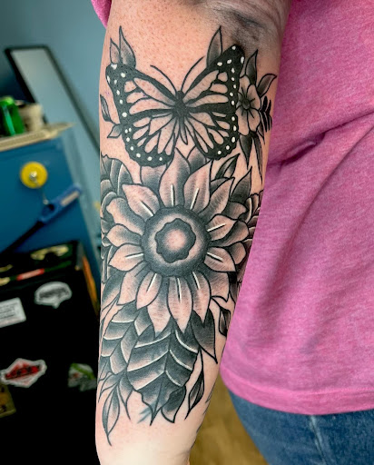 Explore tattoo ideas for men black, creative tattoo ideas in Cookeville, available at Anthem Tattoo