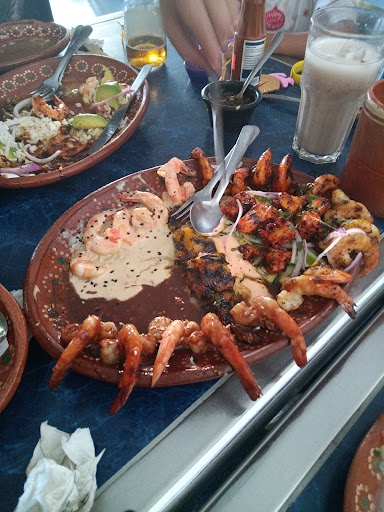 Mariscos Ponte Trucha Negro