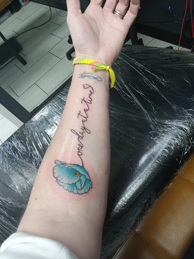 Explore virgo tattoo ideas, creative tattoo ideas in Cadillac, available at Limitless Ink Tattoo Studio