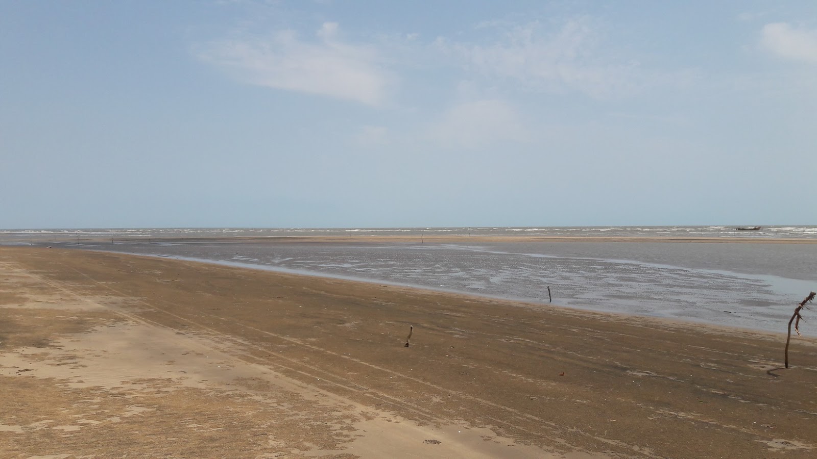 Dindi Beach的照片 带有长直海岸