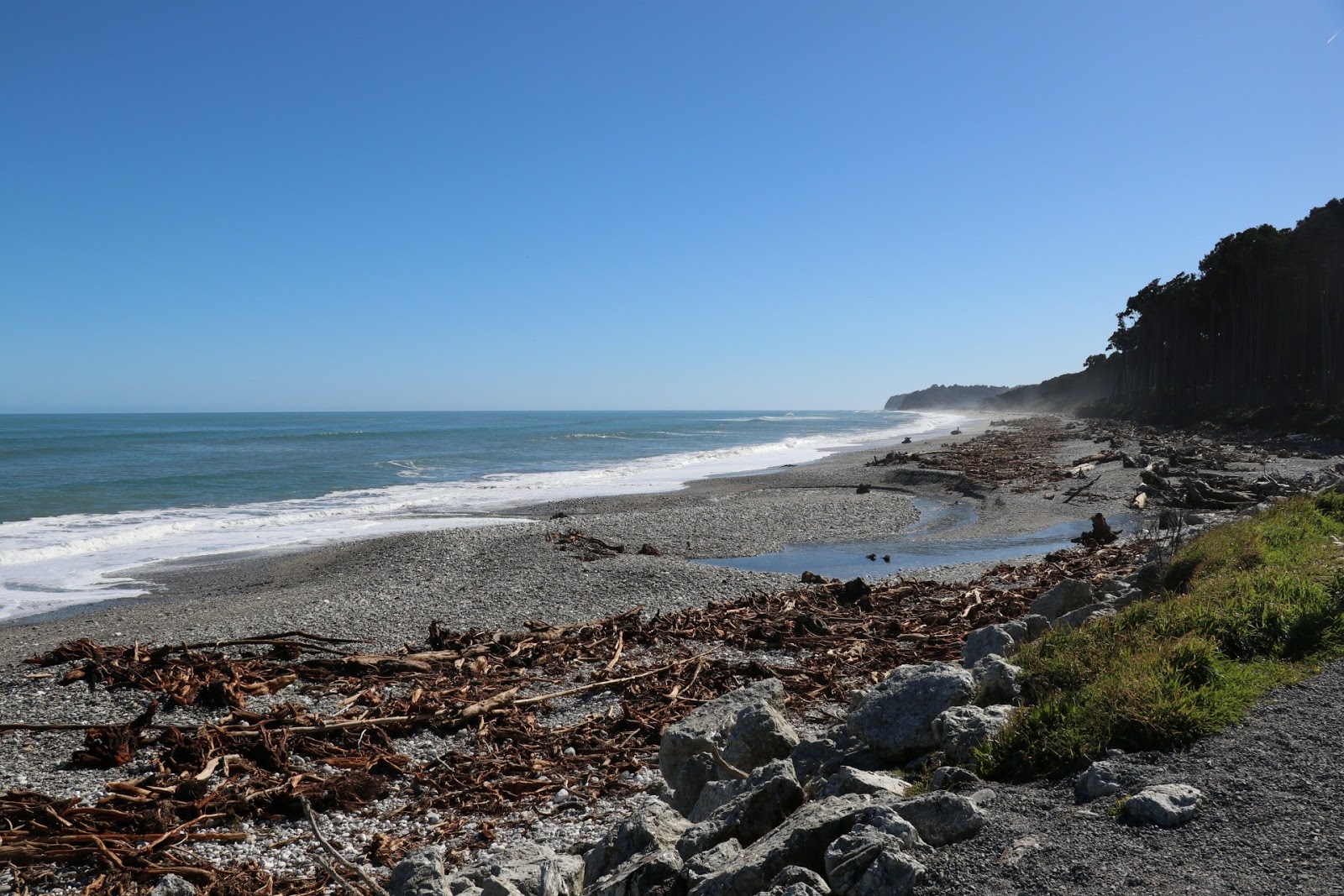 Photo of Ship Creek Beach backed by cliffs