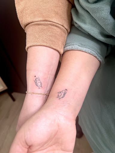 Explore back of neck tattoo ideas, creative tattoo ideas in Tooele, available at Elevn11 Piercings