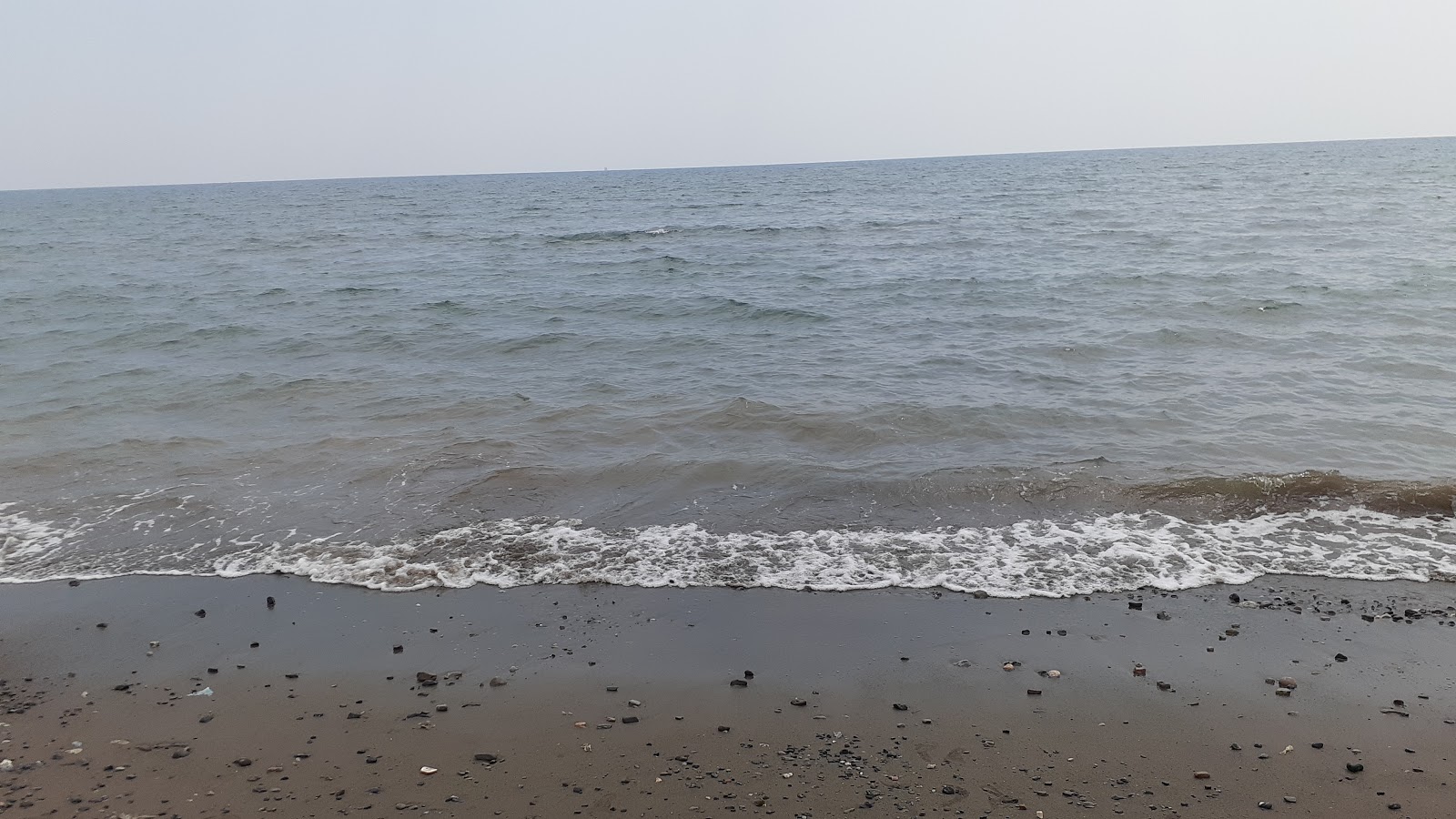 Foto av Dortyol beach med lång rak strand