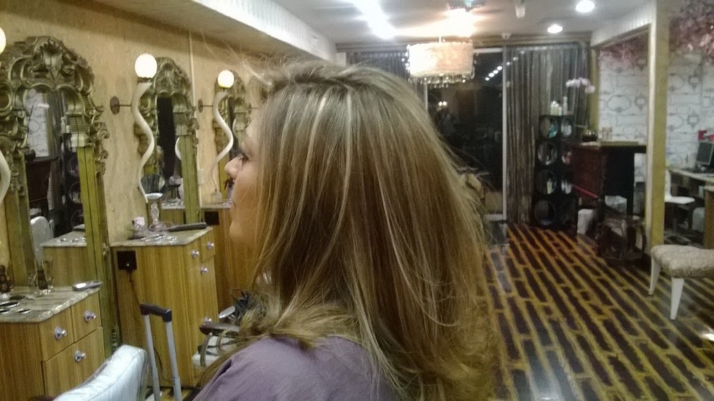 GEORGE HAIR DESIGN AT THE HAIR LOUNGE 33009