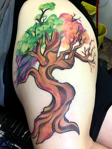 Explore tribal sun tattoo ideas, creative tattoo ideas in Stuart, available at Urban Inkers Tattoos