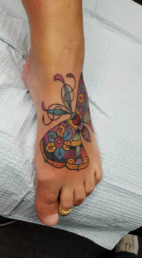 Explore godmother tattoo ideas, creative tattoo ideas in Cincinnati, available at Tattoo Makers
