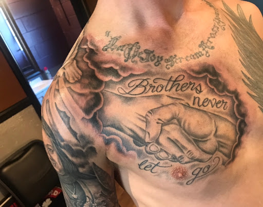 Explore family birthstone tattoo ideas, creative tattoo ideas in Toledo, available at Perfectly Pierced & Permanently Scarred, Permanent Skin Artistry