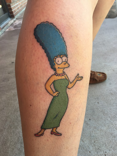 Explore women's wrist tattoo ideas, creative tattoo ideas in Kansas City, available at Waldos Darkside Tattoo