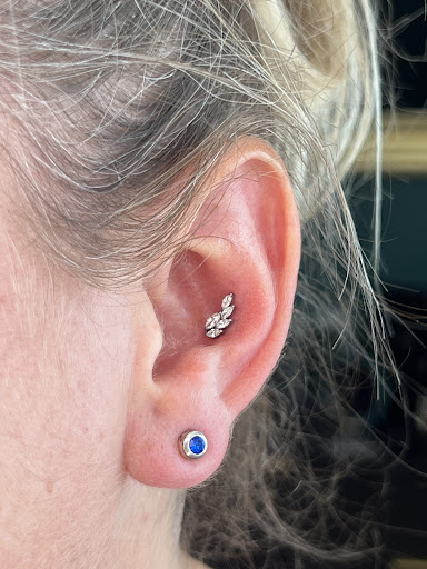 Explore middle of boob tattoo ideas, creative tattoo ideas in Draper, available at Happy Pierced Draper, UT