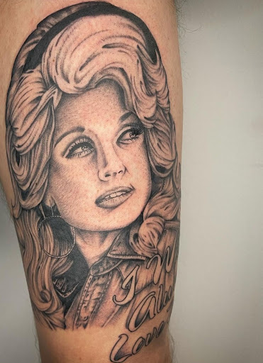 Explore women's spine tattoo ideas, creative tattoo ideas in Seymour, available at Golden Heart Tattoo Company