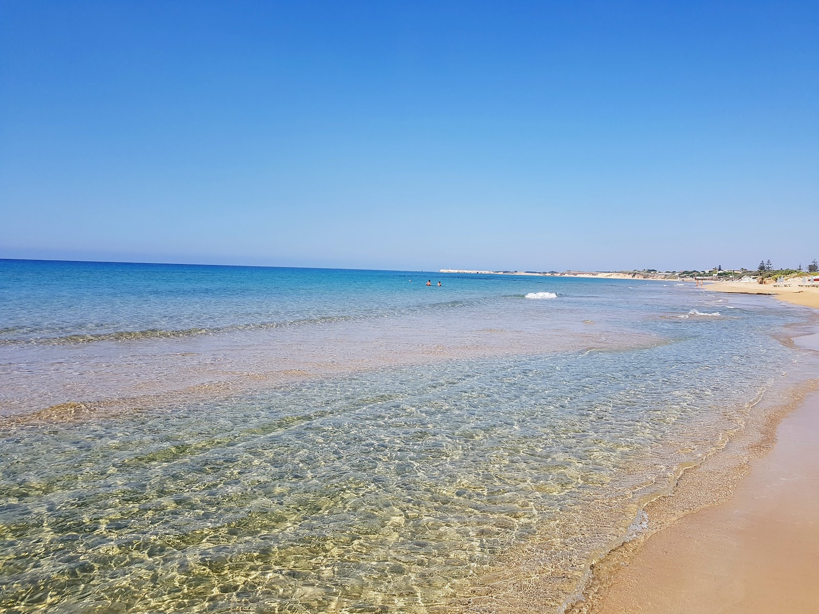 Foto von Carratois Strand mit brauner sand Oberfläche