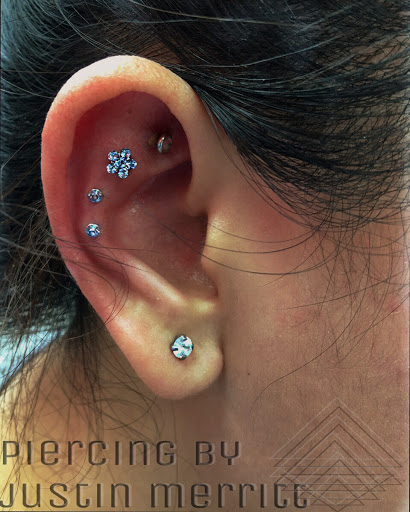 Explore rhino tattoo ideas, creative tattoo ideas in Hampton, available at Blue Horseshoe Tattoo and Body Piercing