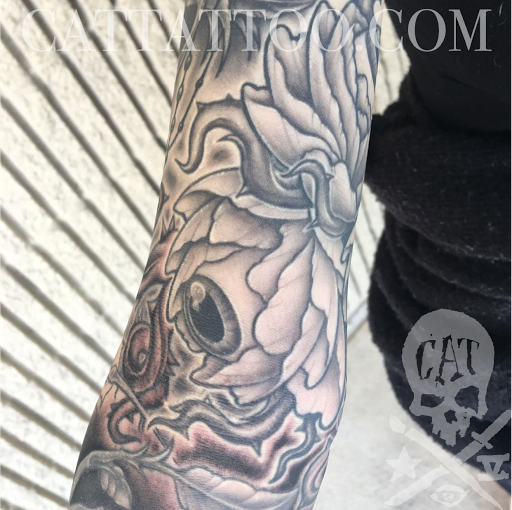 Explore candy tattoo ideas, creative tattoo ideas in Addison, available at Cat Tattoo