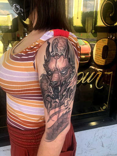 Explore ass tattoo ideas, creative tattoo ideas in Marietta, available at The Queen Bee Tattoo and Piercing Parlour