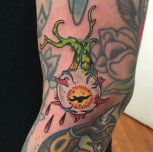 Find tattoo crown ideas for your next unique tattoo in Katy at Artistic Impressions Tattoo Studio