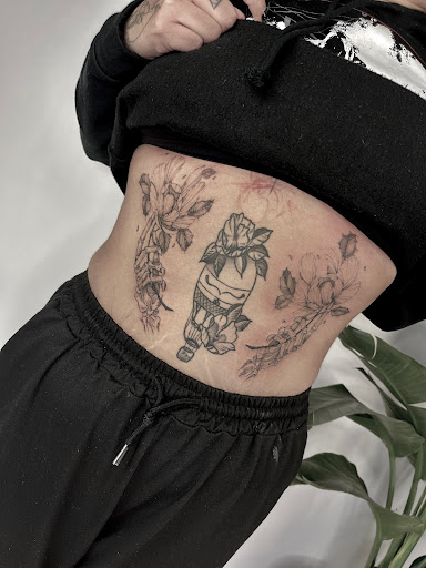 Explore tattoo ideas for happiness, creative tattoo ideas in Southampton, available at Le Uke Tattoo Studio