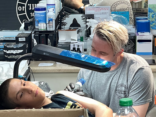 Explore man face tattoo ideas, creative tattoo ideas in Augusta, available at Excalibur Art Collective