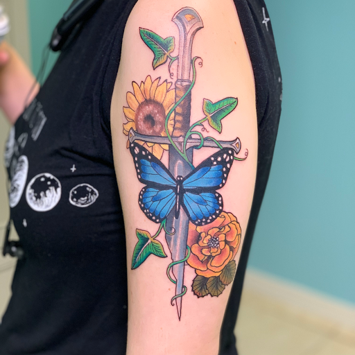 Explore tramp stamp lower back tattoo cover up ideas, creative tattoo ideas in Ocala, available at The Tattoo Gallery of Ocala LLC