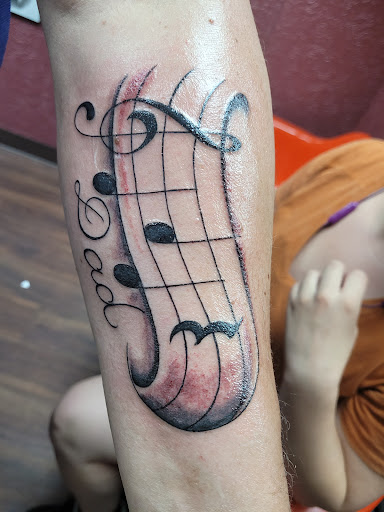 Tattoo Shop «American Graffiti Tattoos», reviews and photos, 630 W Grand River Ave, Brighton, MI 48116, USA