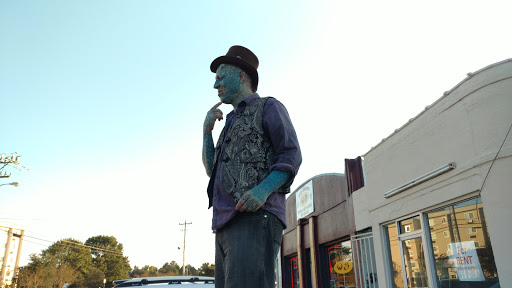 Explore dog bone tattoo ideas, creative tattoo ideas in Lumberton, available at Wicked Skinsations