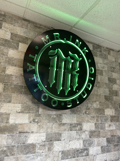 Explore green arrow tattoo ideas, creative tattoo ideas in Pine Brook, available at Mr Ink Tattoo Studio