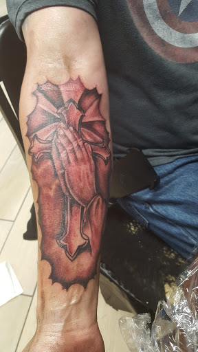 Explore cover up tattoo ideas on shoulder, creative tattoo ideas in Houston, available at Orlandos Tattoo Studio