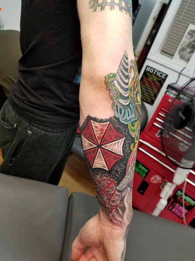 Explore gunslinger tattoo ideas, creative tattoo ideas in Georgetown, available at Body Art Tattoos